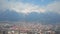 Winter panorama of beautiful European city and mountains covered with snow