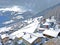 Winter panorama with a fairytale view of the snow-covered alpine village of Lain in the municipality of Vaz-Obervaz