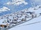 Winter panorama with a fairytale view of the snow-covered alpine village of Lain in the municipality of Vaz-Obervaz