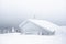 Winter panorama landscape with cottage, trees covered snow, fog. Winter background of snow and frost.Picturesque and gorgeous