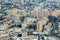 winter panoramic aerial view of a huge residential complex with high-rise buildings with snow