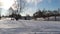 Winter panoramic view on a small lake, it is almost under the ice.