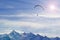 Winter paragliding in alps mountains