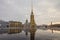 Winter Peter and Paul cathedral with reflection in puddle