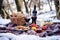 winter picnic setup with wine and cheese