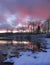 Winter pond sunset and snow