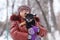 Winter portrait of a girl and puppy