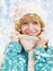 Winter portrait of a young cheerful happy women