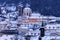 Winter in Prague - city panorama with St. Nicholas Church