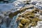 Winter Probiy waterfall on Prut River in Yaremche, Carpatians, Ukraine