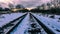 The winter railroad moves towards the sky with a mood