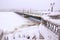 winter, river in snow, pedestrian bridge, haze