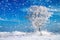 Winter rural landscape with one tree and blue sky