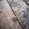 Winter\\\'s Embrace: Snow Blanket on Rustic, Weathered Wooden Surface