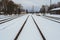 Winter\\\'s Path: Snowy Railway Tracks in Ventspils