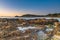 Winter`s Sunrise at Surf Beach with Craggy Rocks