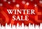 Winter Sale with red Sale in background besides textblock and white firs and snowflakes
