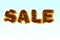 Winter SALE. Wooden letters forming the word SALE on snow, banner for marketing.