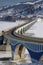 Winter scene at Poiana Largului viaduct with frozen lake of Bicaz