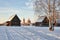 Winter Scene with Russian Old Wooden Houses in Suzdal