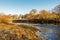 Winter scene on a scottish River, the Water of Ken, with a suspension bridge