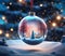 Winter scene snow globe Christmas bauble, with small cottage in a snow covered forest. Bokeh Christmas lights background