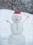 Winter scene with snowman cook on white snow background. Greeting snowman cook. Funny snowmen cooking. Snowman on a