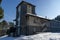 Winter scene in snowy Vitosha mountain with glade, forest and abandoned holiday house