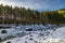 Winter scenery of ice and snow along the White River under Mount Rainier.