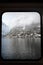 Winter scenic view of village of Hallstatt in the Austrian Alps from window of ship