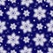 Winter seamless christmas dark blue pattern with white snowflakes