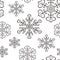 Winter seamless pattern with black snowflakes on white background. Endless snow ornament for banner, card, paper