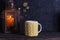 Winter season holidays decorations. Autumn Thanksgiving Background with lantern and knitted cup.