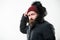 Winter season menswear. Weather resistant jacket concept. Man bearded stand warm jacket parka isolated on white