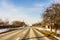 Winter season, view of cars and snowy street through windshield while driving in Bucharest, Romania, 2021