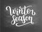 Winter season white lettering text on chalkboard background, illustration. White brush calligraphy for logo, invitation, ba