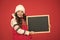 winter shopping sales. announcement board. very profitable proposition. happy girl empty blackboard. copy space. useful