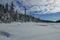 Winter shot of a boreal forest snow covered frozen lake