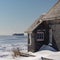 Winter shot of a colorful and rustic coastal shanty.