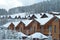 Winter ski chalet, snowy landscape, winter background with copy space