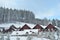 Winter ski chalet, snowy landscape, winter background with copy space