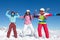Winter, skiing and fun. Three young children and teenage girls on winter holidays