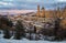 Winter sky over Urbino city covered by snow