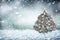 Winter snow background with decorated Christmas tree