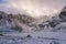 Winter and Snow at Black Pond or Czarny Staw at Rysy Peak in Poland. Panoramic winter landscape with frozen lake