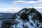 Winter and Snow at Black Pond or Czarny Staw at Rysy Peak in Poland. Panoramic winter landscape with frozen lake