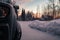 Winter snow blankets driveway and vehicle on a quiet morning at dawn