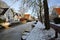 Winter snow and  frozen canals in Broek in Waterland, a small town with traditional old and painted wooden houses