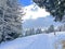 Winter snow idyll along the rural alpine road above the tourist resort of Lenzerheide