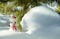 Winter Snowman near snowdrift